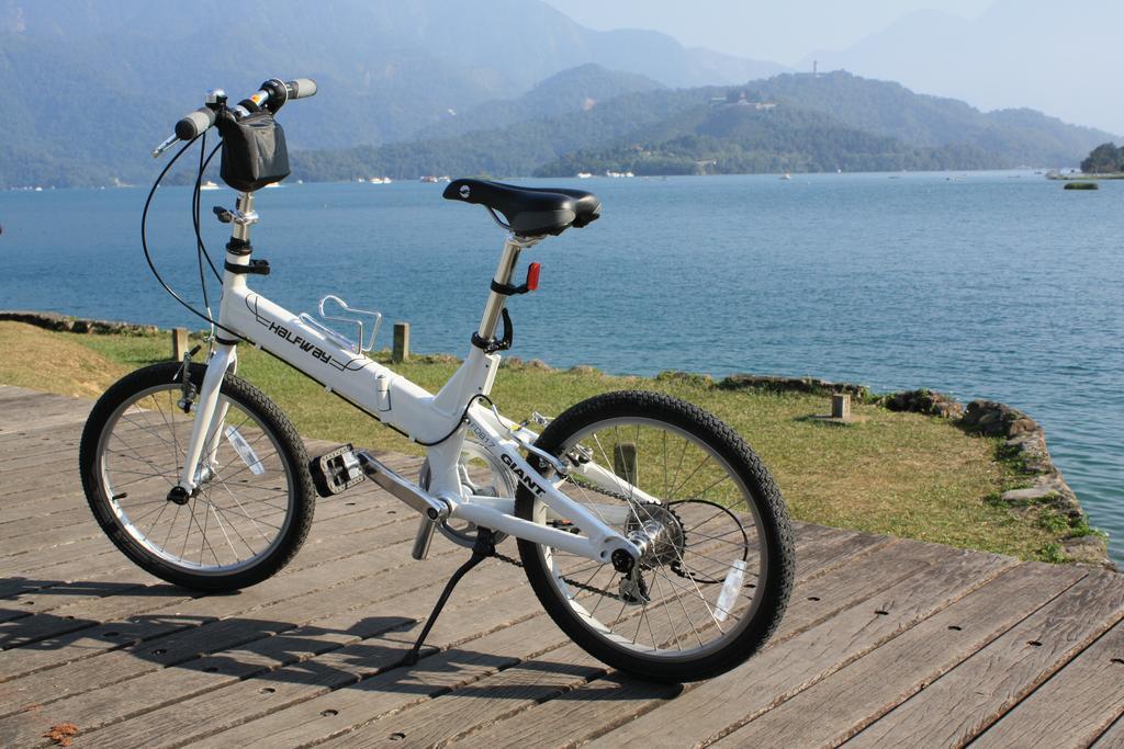 Fleur De Chine Hotel Yuchi Luaran gambar A folding bicycle